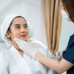 young Asian woman making cosmetology treatment skin injection, Mesotherapy of face beauty care