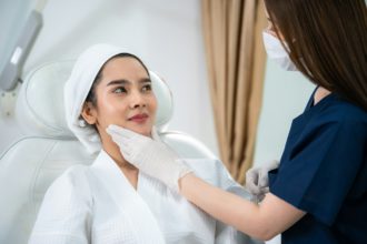 young Asian woman making cosmetology treatment skin injection, Mesotherapy of face beauty care